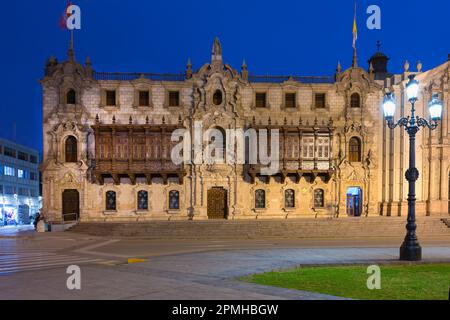 Facade and balconies, Archbishop's Palace at night, Lima, Peru, South America Stock Photo