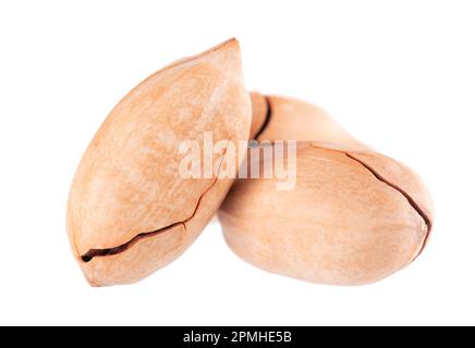 Pecan nuts isolated on white background. Unshelled pecan. Clipping path Stock Photo