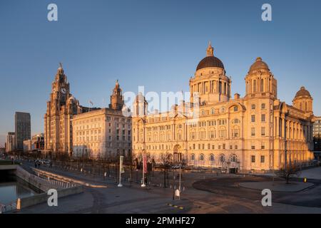 Evening Light on The Pier Head featuring the Royal Liver Building, the Cunard Building and Port of Liverpool Building, Liverpool Waterfront Stock Photo