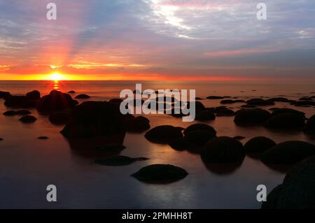 Midsummer sunset over The Wash from the beach at Hunstanton, north Norfolk, England, United Kingdom, Europe Stock Photo