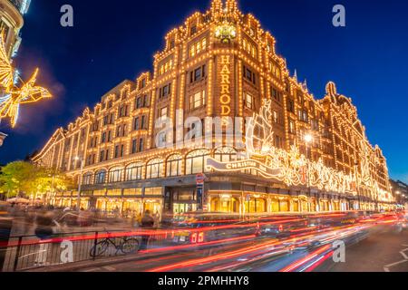 View of Harrods department store illuminated at dusk, Knightsbridge, London, England, United Kingdom, Europe Stock Photo