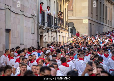 Pamplona, SPAIN: June 07 2022: Thousands of people gathered on the streets of Pamplona waiting for the release of the bulls. First day of 'Encierro' Stock Photo