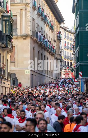 Pamplona, SPAIN: June 07 2022: Thousands of people gathered on the streets of Pamplona waiting for the release of the bulls. First day of 'Encierro' Stock Photo