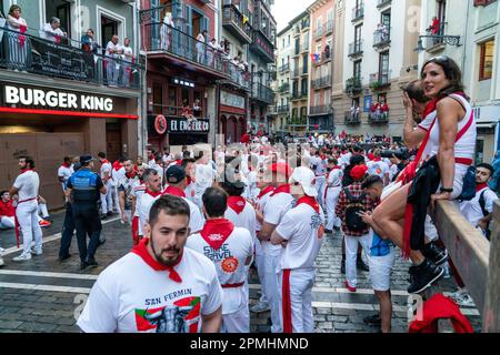 Pamplona, SPAIN: June 07 2022: Thousands of people gathered on the streets of Pamplona waiting for the release of the bulls. First day of 'Encierro' Stock Photo