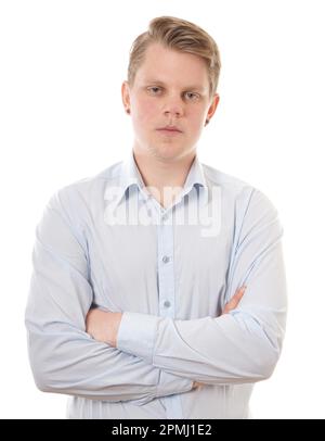 young buisness man with folded arms looking serious Stock Photo