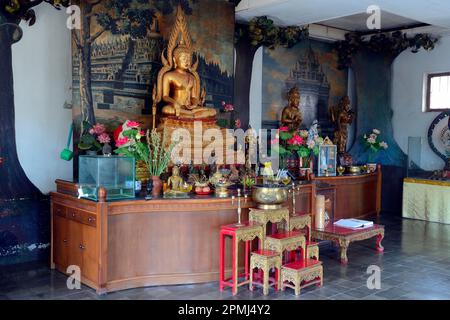 Buddha statue on an altar in a prayer room of the Buddhist monastery Brahma Vihara, Banjar, North Bali, Bali, Indonesia Stock Photo