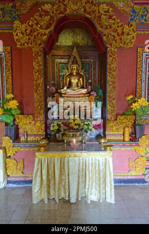 Buddha statue on altar in prayer room of the Buddhist monastery Brahma Vihara, Banjar, North Bali, Bali, Indonesia Stock Photo