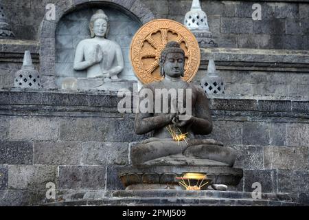 Buddha statue on altar, outside of the Buddhist monastery Brahma Vihara, Banjar, North Bali, Bali, Indonesia Stock Photo