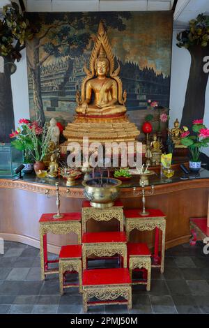 Buddha statue on an altar in a prayer room of the Buddhist monastery Brahma Vihara, Banjar, North Bali, Bali, Indonesia Stock Photo