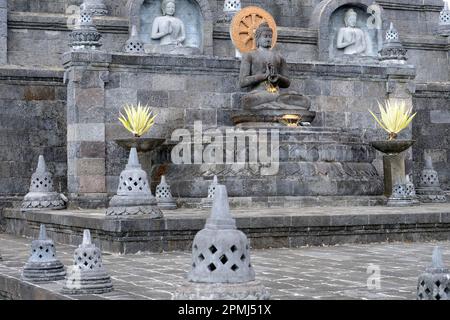 Buddha statue on altar, outside of the Buddhist monastery Brahma Vihara, Banjar, North Bali, Bali, Indonesia Stock Photo