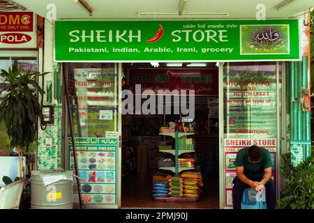Pattaya,Thailand - March 13,2023:Downtown This is a small Arabian grocery store,which provides oriental food.Its name Sheik Store and the sign is gree Stock Photo