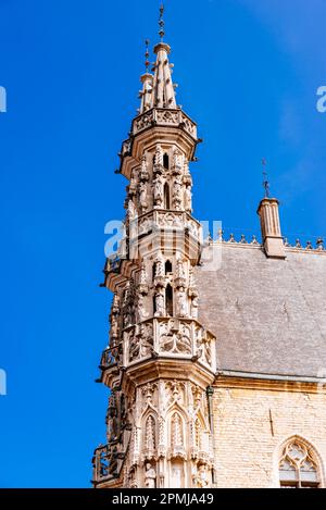 Detail of towers. The Town Hall of Leuven, Flemish Brabant, is a landmark building on that city's Grote Markt, main square. Built in a Brabantine Late Stock Photo