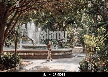 Marbella Spain. April 9, 2023 Tourists at the fountain of La Alameda park in the heart of the historic center of this Andalusian city in the province Stock Photo