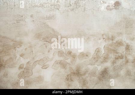 Detail of damp stain on white lime washed wall plaster, abstract background Stock Photo