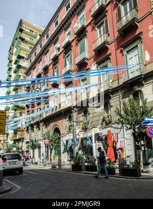 April 2, 2023, Naples, Italy:  Celebratory blue and white bunting and streamers marking the success of the S.S.C. Napoli football team.  Via Duomo, Ce Stock Photo