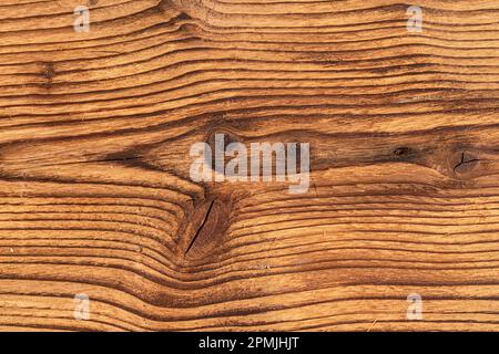 Detail on wooden boards, grain of wood enhanced by burning, view from above Stock Photo