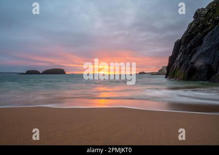 Sunrise at Ballintoy beach, Causeway Coast, Northern Ireland Stock Photo