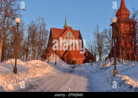 Church of Kiruna in winter during sunset. Kiruna church and is one of Sweden's largest wooden church buildings. Stock Photo