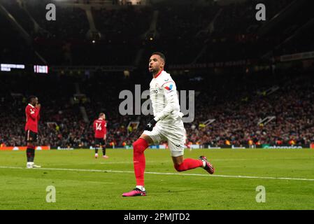 Sevilla's Youssef En-Nesyri celebrates their side's second goal of the game, an own goal scored by Manchester United's Harry Maguire during the UEFA Europa League quarter-final first leg match at Old Trafford, Manchester. Picture date: Thursday April 13, 2023. Stock Photo