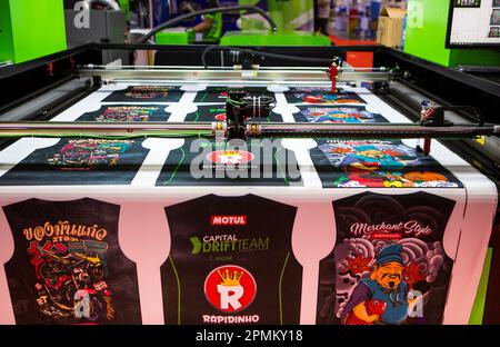 Bangkok, Thailand - March 31, 2023: Sublimation printer printing T shirt show in Print Tech 2023. Stock Photo