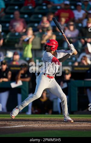 Clearwater Threshers Justin Crawford (13) loses his helmet as he slides  home safely during an MiLB Florida State League baseball game against the  Bradenton Marauders on April 8, 2023 at LECOM Park