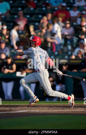 Clearwater Threshers Justin Crawford (13) loses his helmet as he slides  home safely during an MiLB Florida State League baseball game against the  Bradenton Marauders on April 8, 2023 at LECOM Park