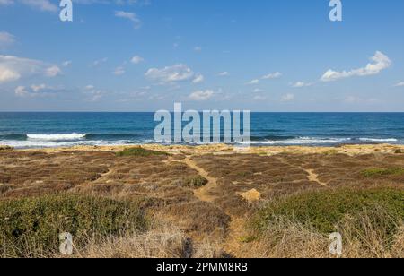 Coast of the mediterranean sea in the north of Israel with beautiful clouds Stock Photo