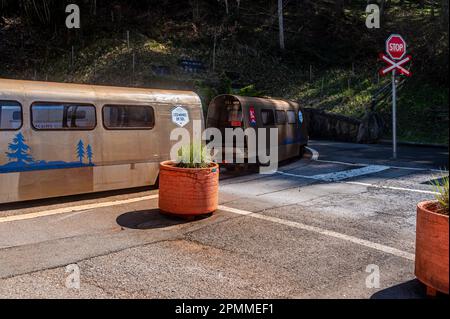 Bex, Vaud Canton, Switzerland - 8 April 2023: Tourists on a cave train on visiting the salt mines of Bex on Switzerland. Stock Photo