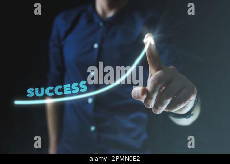 Man point on visual blue arrow with word success. Visual concept of business success and growth Stock Photo