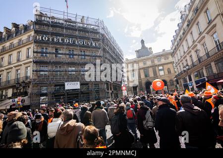 Paris, France. 13th Apr, 2023. Protesters march on the street during the rally. New wave of protests on the 12th day of the general strike over the Macron government's new pension reform, before crucial court decision on the legislation of the Constitutional Council. (Photo by Telmo Pinto/SOPA Images/Sipa USA) Credit: Sipa USA/Alamy Live News Stock Photo
