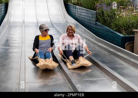 The large Slide at the Superbloom exhibition installation, London, the Tower of London Stock Photo