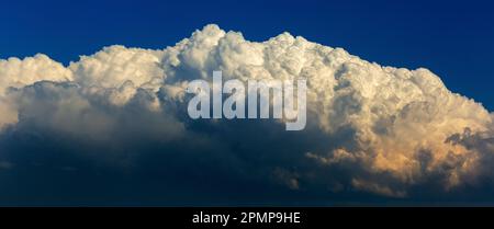Panorama of dramatic storm clouds and blue sky above; Calgary, Alberta, Canada Stock Photo