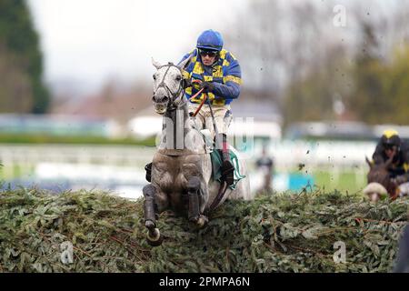 Bill Baxter ridden by jockey Sam Twiston-Davies clear a fence on their way to winning the Randox Supports Race Against Dementia Topham Handicap Chase during day two of the Randox Grand National Festival at Aintree Racecourse, Liverpool. Picture date: Friday April 14, 2023. Stock Photo