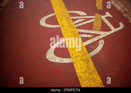 bicycle symbol painted on road indicating a cycle lane Stock Photo