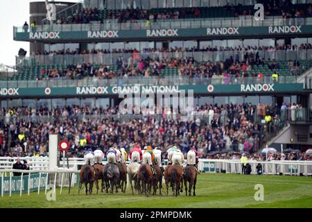 Runners and riders during the Winners Wear Cavani Sefton Novices' Hurdle on day two of the Randox Grand National Festival at Aintree Racecourse, Liverpool. Picture date: Friday April 14, 2023. Stock Photo