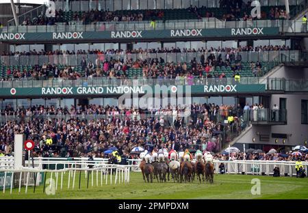 Runners and riders during the Winners Wear Cavani Sefton Novices' Hurdle on day two of the Randox Grand National Festival at Aintree Racecourse, Liverpool. Picture date: Friday April 14, 2023. Stock Photo