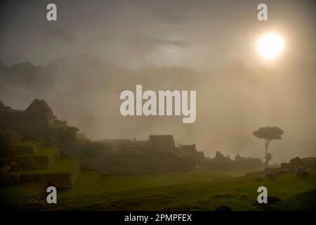 Cloud shrouded Machu Picchu; Machu Picchu, Peru Stock Photo