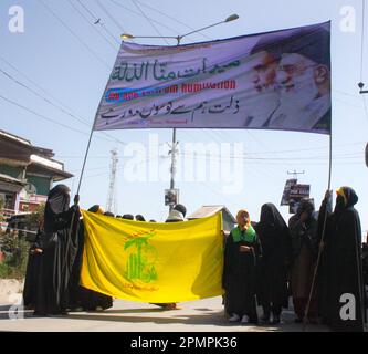 Srinagar, India. 14th Apr, 2023. April 14, 2023, Srinagar, India: Muslims of the The Jammu and Kashmir Shia Association join a rally of the Yaum-ul-Quds or Al Quds Day, which is celebrated by Shias during The last Friday of Ramadan. Al-Quds Day is the last Friday of the month of Ramadan on which demonstrations are held across the world to protest against the occupation of Palestine. Soon after the Islamic revolution in Iran. on April 14, 2023, Srinagar, India. (Photo by Eyepix Group/Sipa USA) Credit: Sipa USA/Alamy Live News Stock Photo