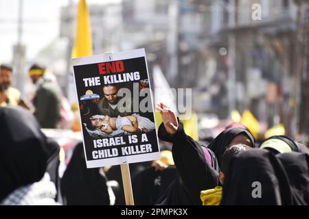 Srinagar, India. 14th Apr, 2023. April 14, 2023, Srinagar, India: Muslims of the The Jammu and Kashmir Shia Association join a rally of the Yaum-ul-Quds or Al Quds Day, which is celebrated by Shias during The last Friday of Ramadan. Al-Quds Day is the last Friday of the month of Ramadan on which demonstrations are held across the world to protest against the occupation of Palestine. Soon after the Islamic revolution in Iran. on April 14, 2023, Srinagar, India. (Photo by Eyepix Group/Sipa USA) Credit: Sipa USA/Alamy Live News Stock Photo