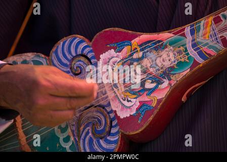 Close up of a traditional dranyen, a lute like instrument; Paro Valley, Bhutan Stock Photo