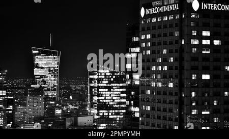 Warsaw, Poland. 14 March 2023. Beautiful architecture of Warsaw city center with modern skyscrapers at night. Black and white. Stock Photo