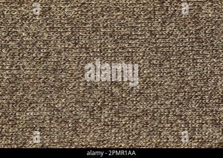 The texture of a knitted wool mix beige brown. texture jersey. background Stock Photo