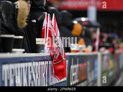 Kingsholm Stadium, Gloucester, Gloucestershire, UK. 14th Apr, 2023. Gallagher Premiership Rugby, Gloucester versus Bath; wet Gloucester flags and Guinness in the terraces Credit: Action Plus Sports/Alamy Live News Stock Photo