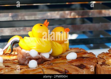 marzipan art chicken bird nest cake dessert, easter speciality Stock Photo