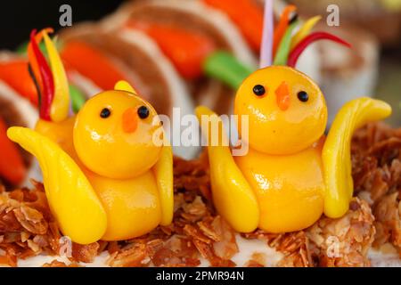 Funny easter marzipan chicken for cake topping Stock Photo
