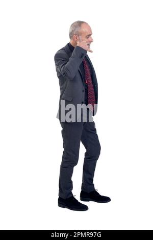 man making phone gesture with his hands white background Stock Photo