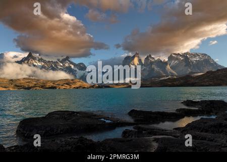 Sunrise over the Cuernos del Paine, Torres del Paine National Park and Lago Pehoe, Chilean Patagonia, Chile Stock Photo