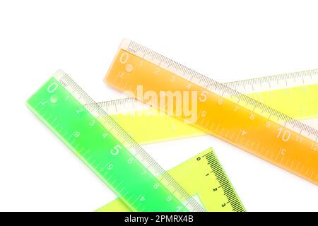 Colorful triangle and straight plastic rulers on white background Stock Photo