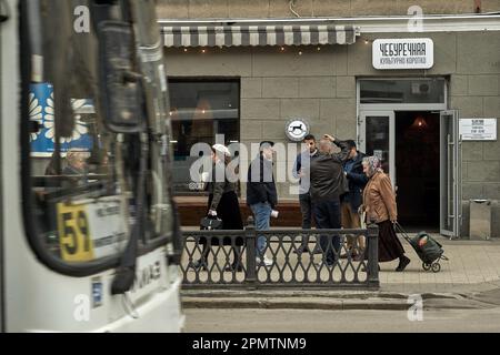 Voronezh, Russia. 12th Apr, 2023. Crowd of people near Cheburechnaya on Pushkinskaya Street in Voronezh. By mid-April, spring warmth came to Voronezh. In a city with a million inhabitants, the last snow has melted, and people have changed their winter clothes to lighter ones. Credit: SOPA Images Limited/Alamy Live News Stock Photo