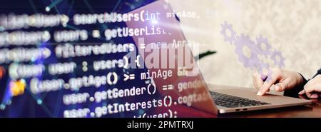girl programmer at home writes programming code script on virtual Stock Photo